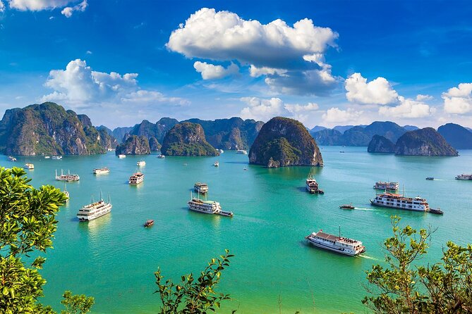 Sail through limestone islands and serene emerald waters.